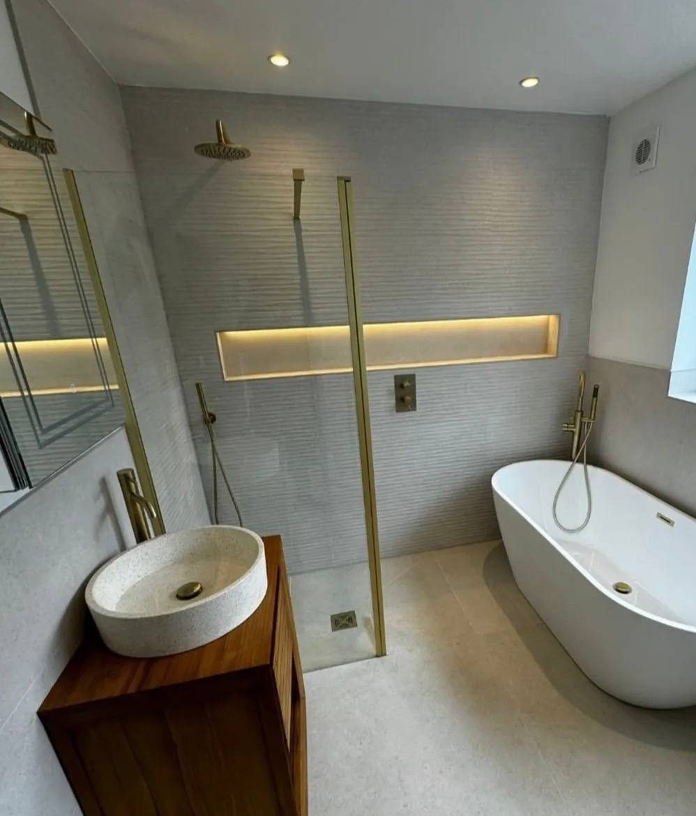 Bathroom installed by Plumber To The Rescue Leeds with a freestanding bath and walk-in shower